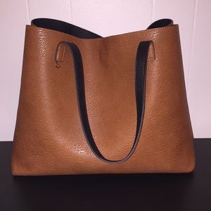 Street Level reversible faux leather tote/wristlet